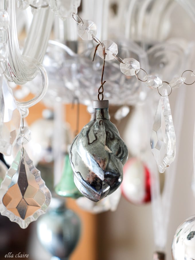 I love this idea of putting vintage Christmas ornaments on a chandelier! 