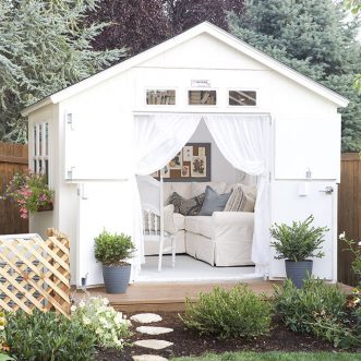 DIY backyard She Shed to relax, read, visit, and work with all the comforts of home. #homedecor #sheshed #farmhouse #momcave #cottagestyle #farmhousestyle #blue