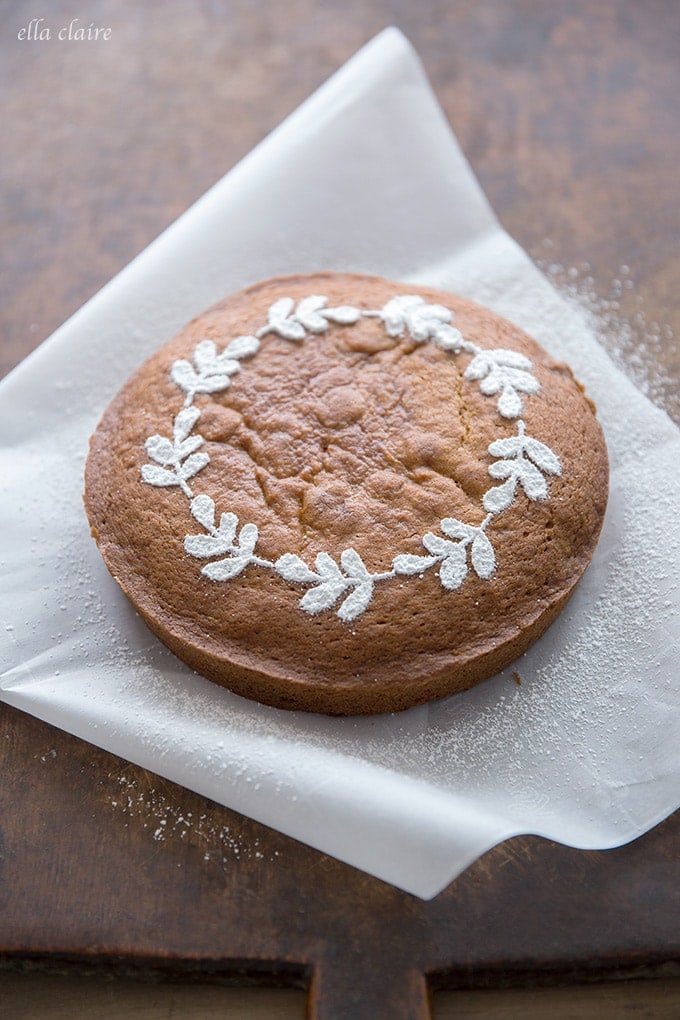 Fall cake stencil for easy and beautiful cake with beautiful powdered sugar leaf wreath.
