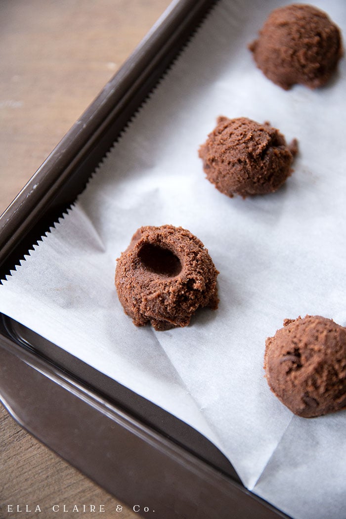 Create a crater to add junior mints to these double chocolate cookies