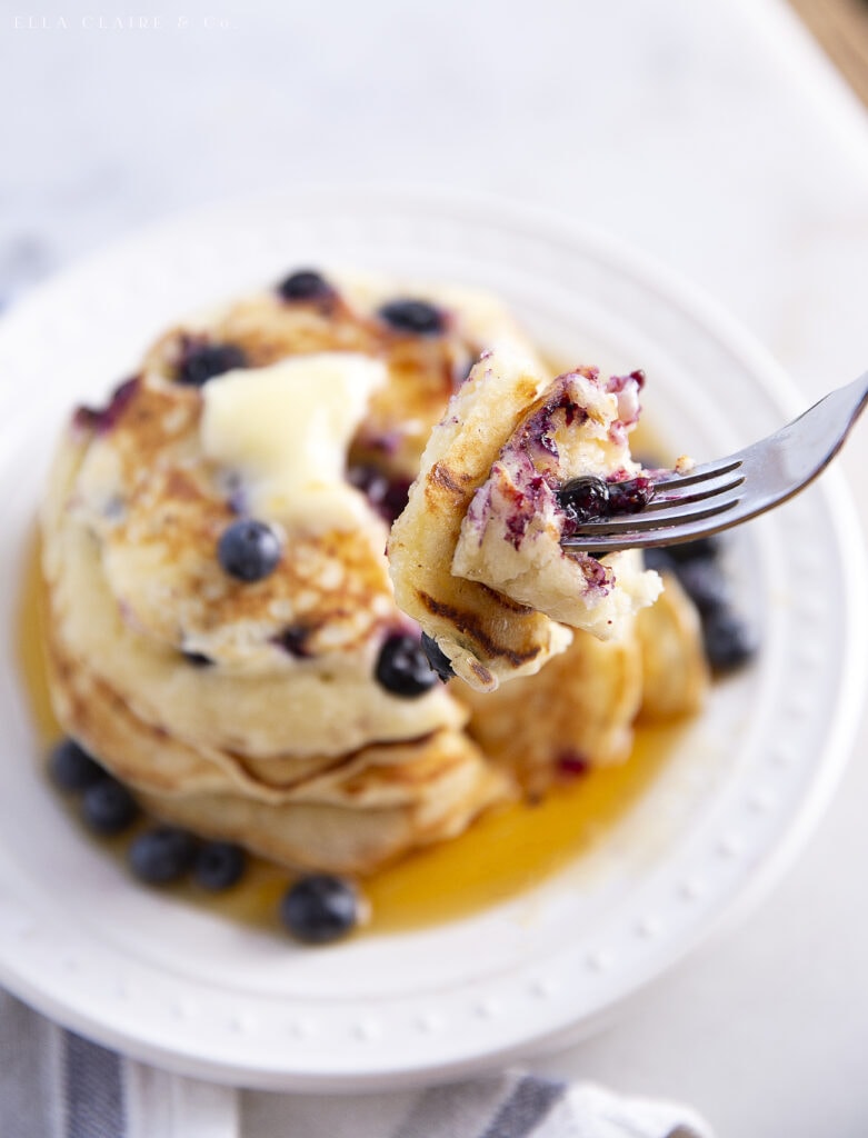 a bite of blueberry pancakes