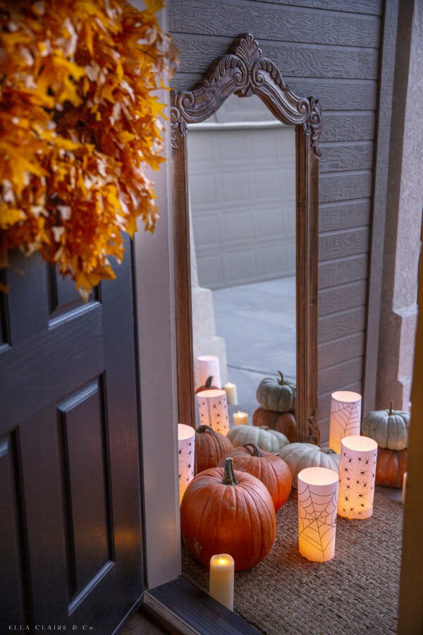 door opening with fall wreath to halloween porch
