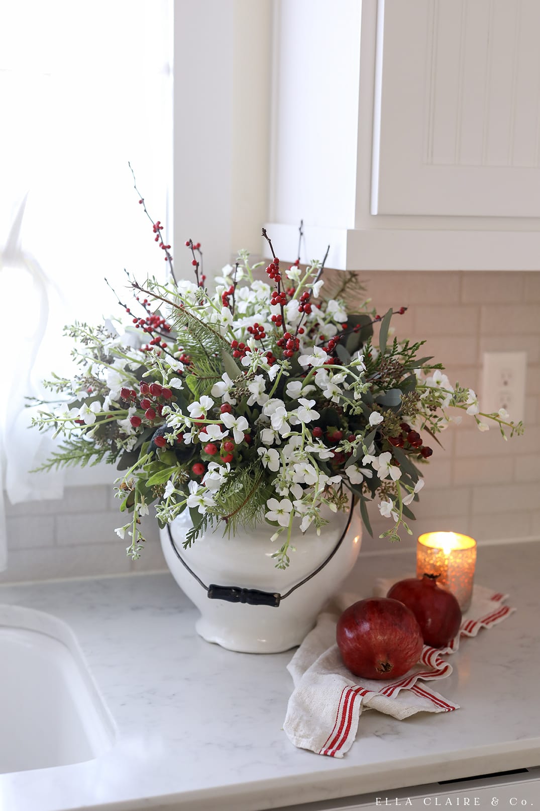 Christmas red, white and green flower arrangement